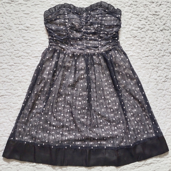 Strapless black and silver lace dress with ruffle and ribbon details - Picture 1 of 7